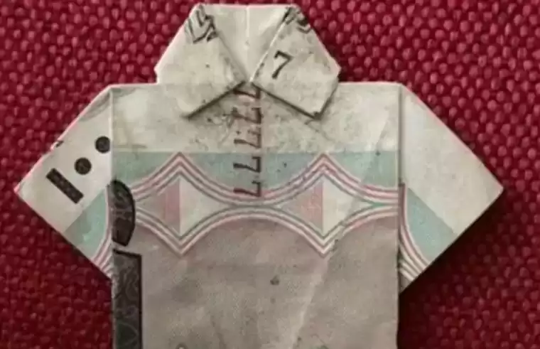 Житель Челнов продает «заряженную» на удачу «рубашку» из купюры за миллион рублей