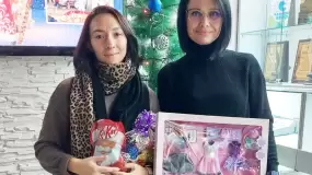 От отдела эксплуатации УАТ подарки принесли Анна Дочкина и Наталья Трофимова