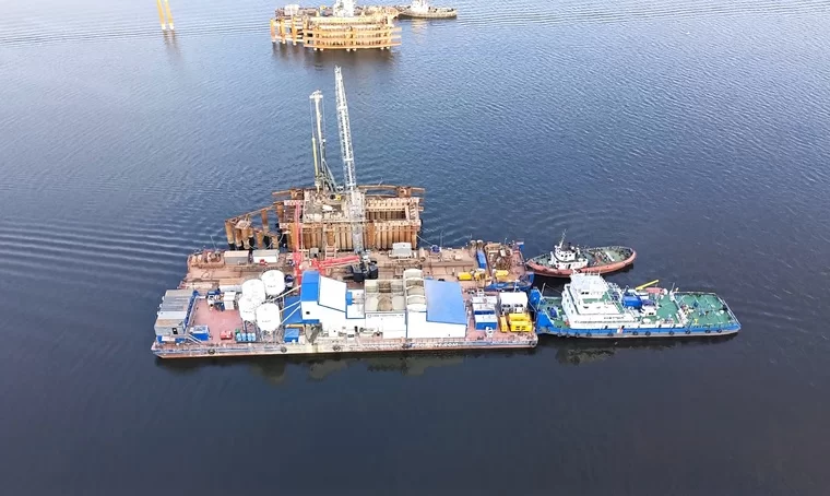 Устройство свайного основания опоры