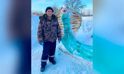 В Татарстане житель села украсил двор масштабной снежной скульптурой змеи