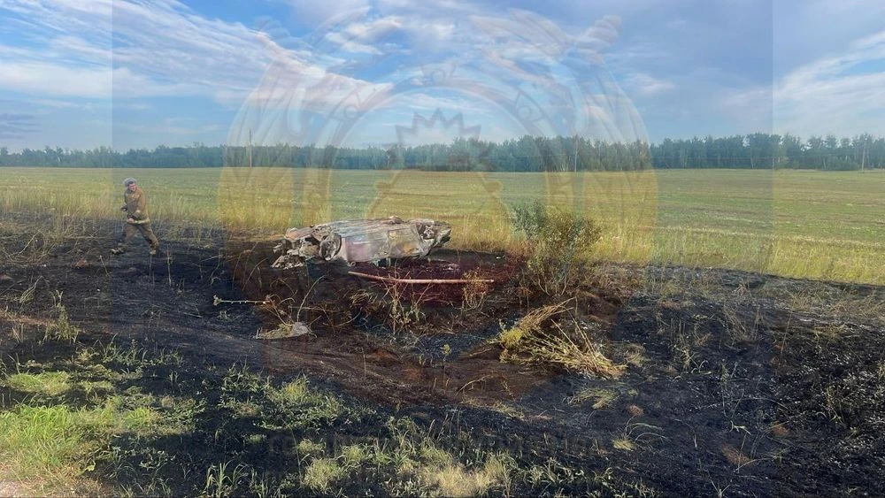 сгоревшая машина Opel Astra в кювете