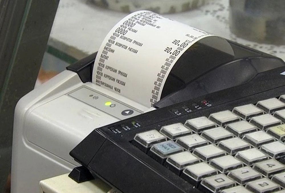 кассовый аппарат в магазине чек