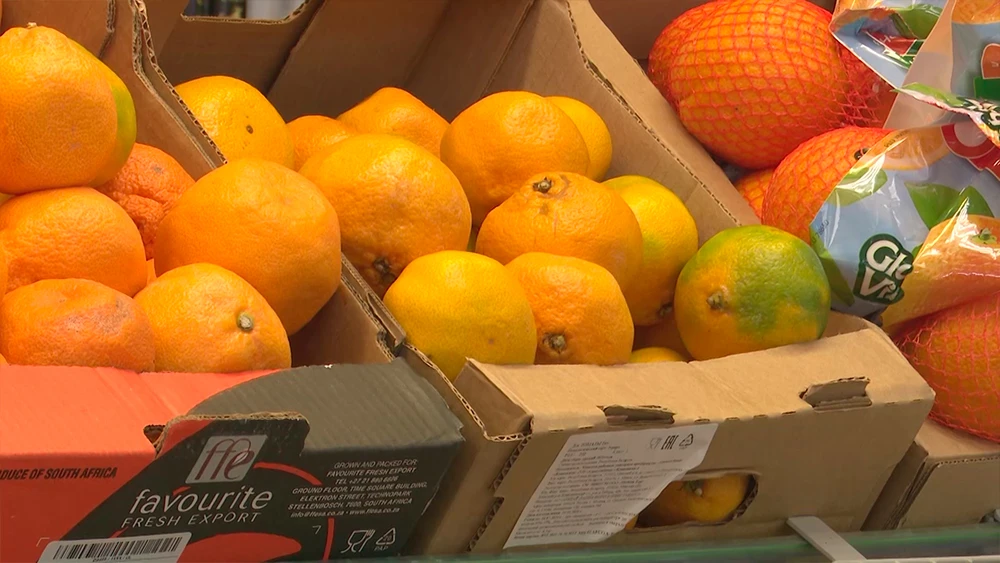 Апельсины в коробках