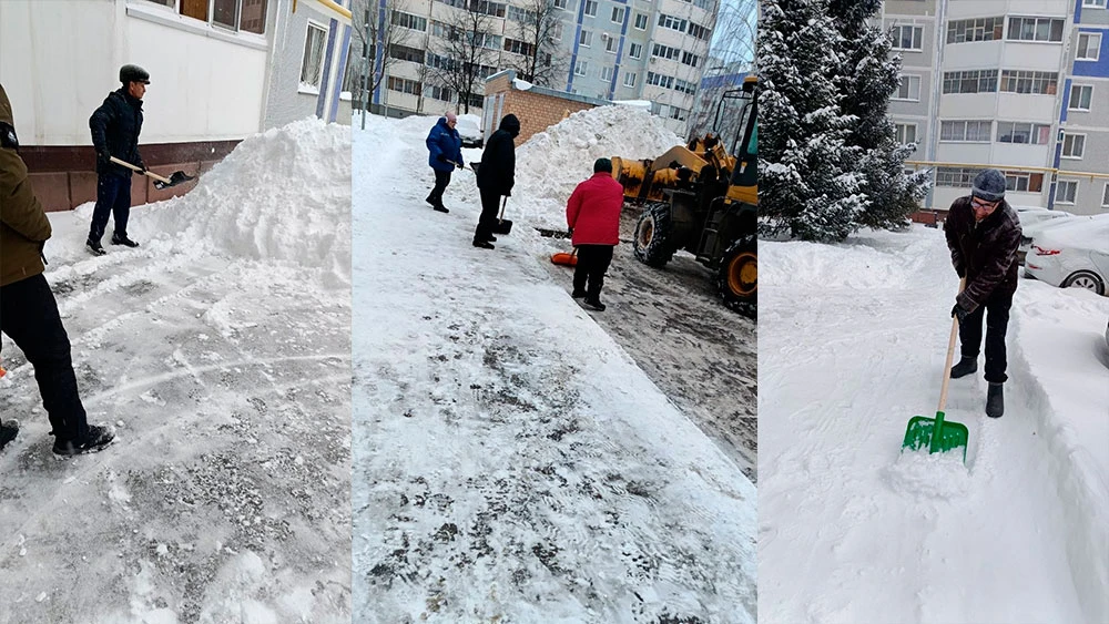 жители Нижнекамска помогают дворнику убирать снег после метели